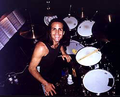 drummer Gregg Gerson smiling on kit